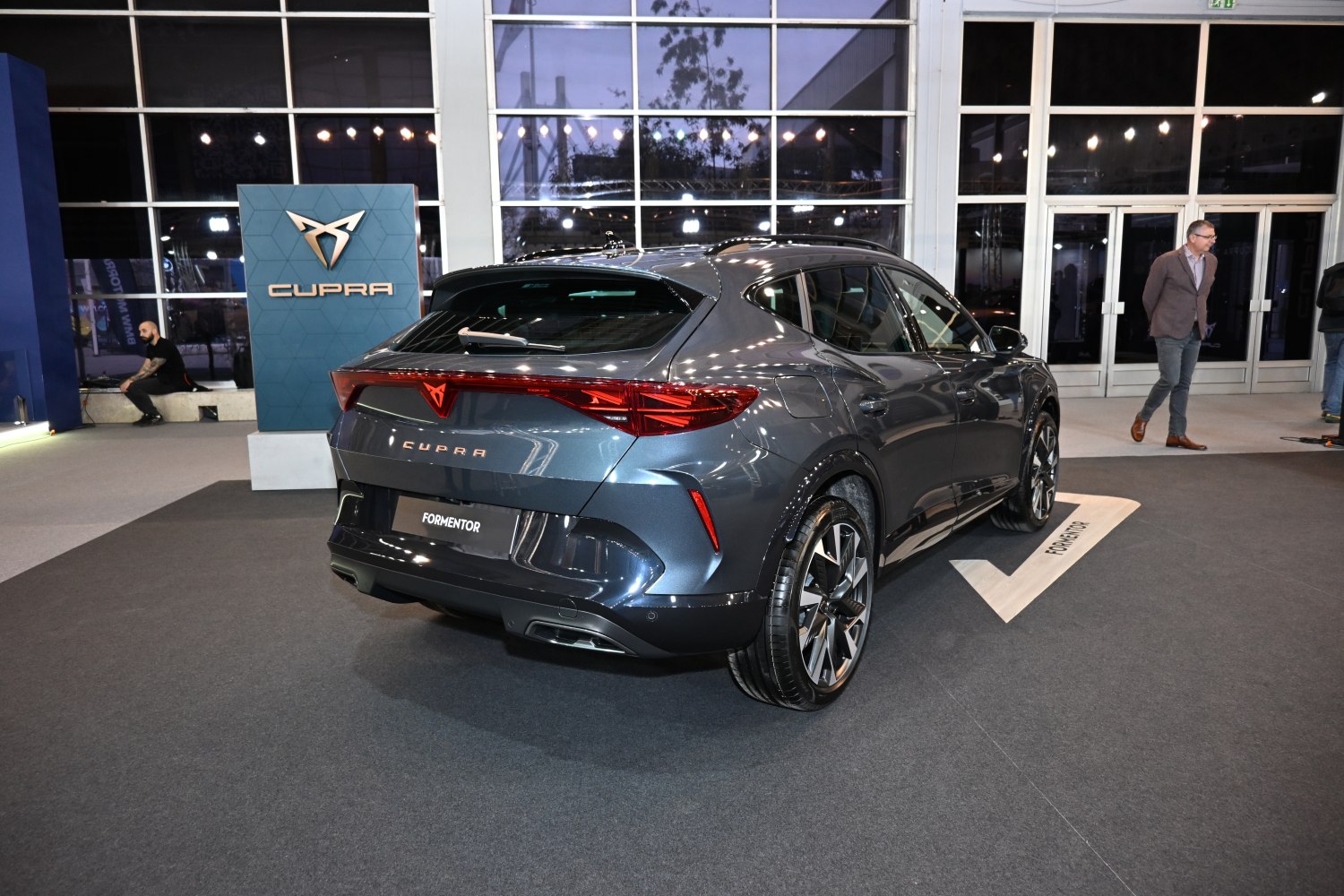 Rear view of modern SUV with LED tail lights and sporty alloy wheels