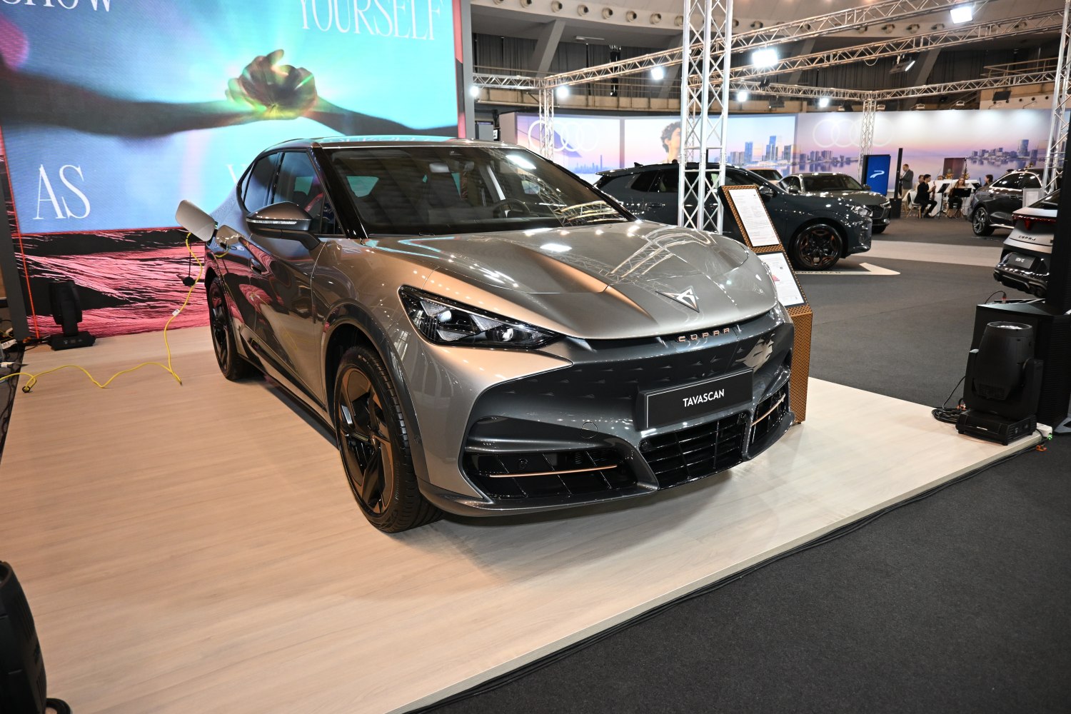 Front view of an electric SUV with LED headlights and aerodynamic design