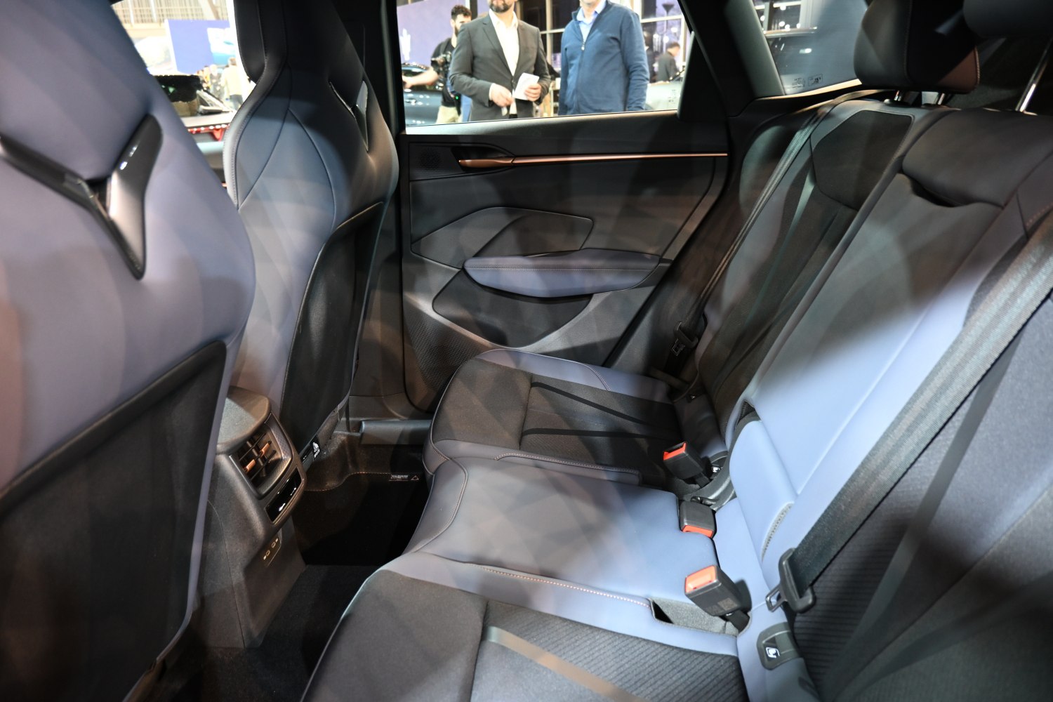 Modern rear seat interior with premium upholstery and spacious design
