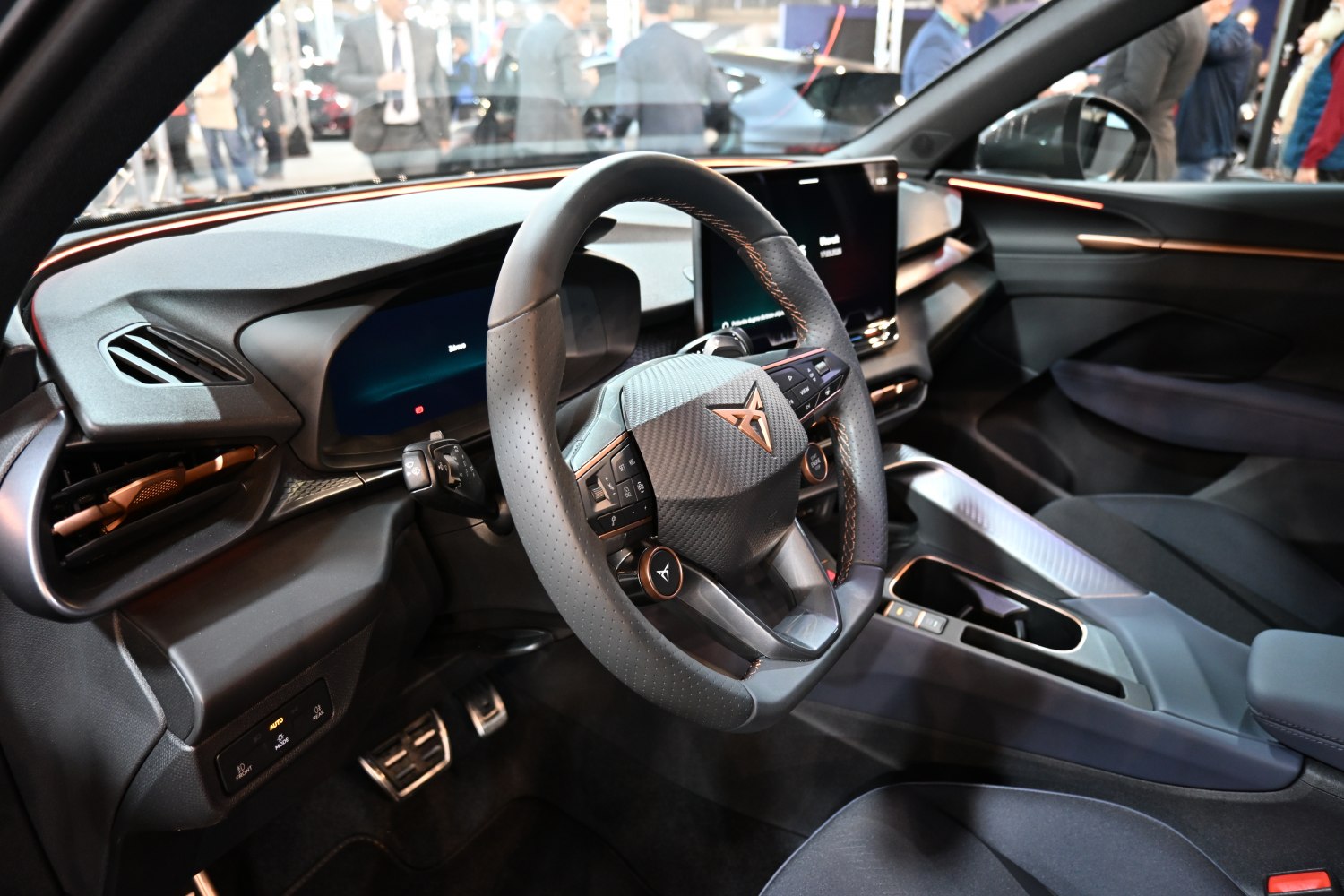 Steering wheel and digital dashboard in modern car interior