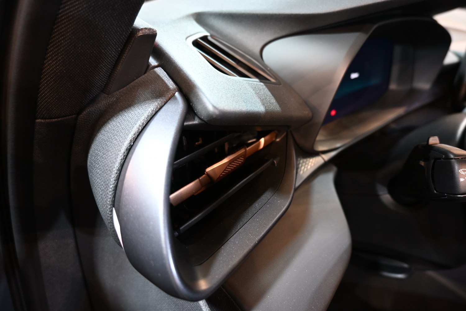 Close-up of interior air vent and dashboard area