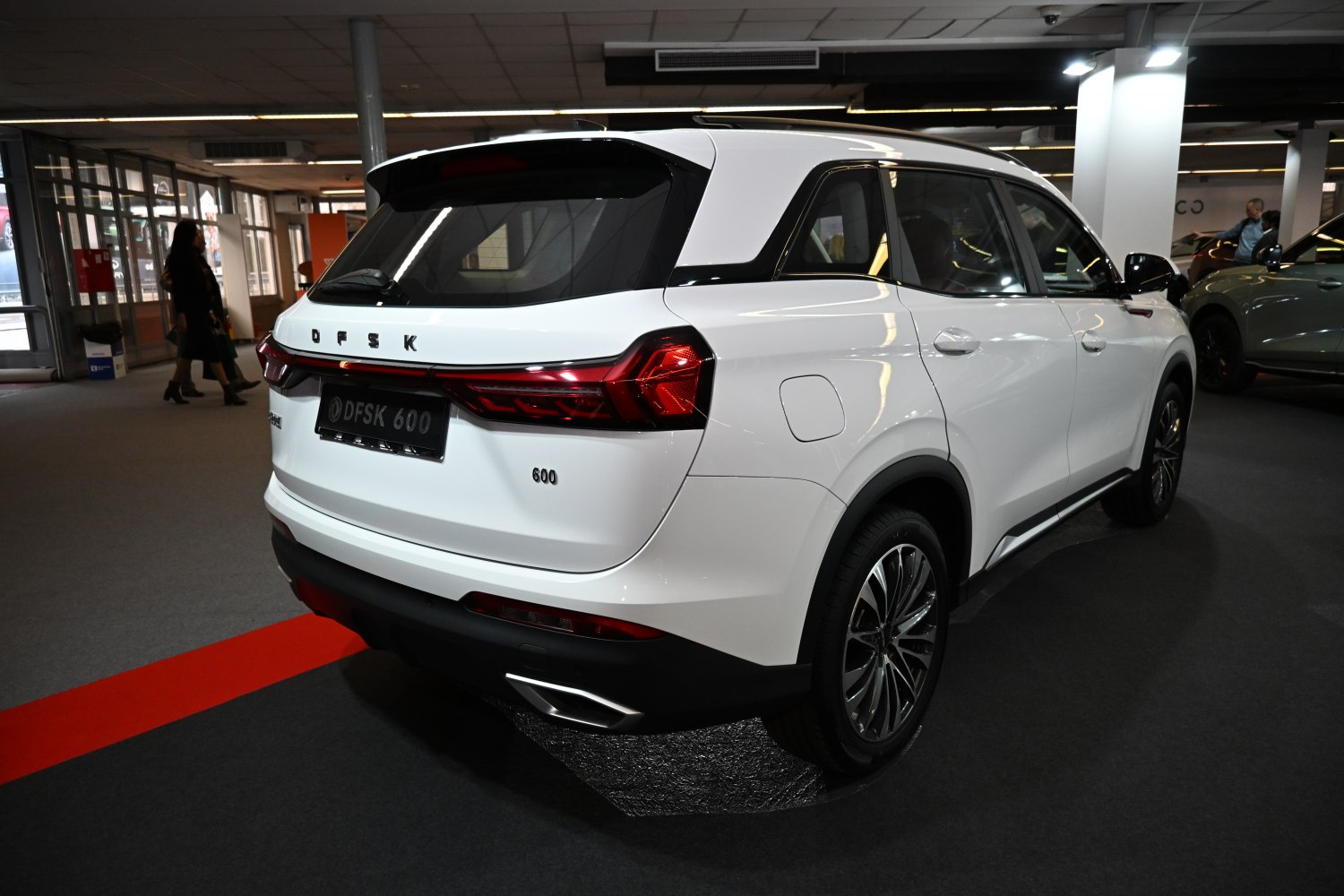 Rear view of SUV with LED tail lights and dual exhaust