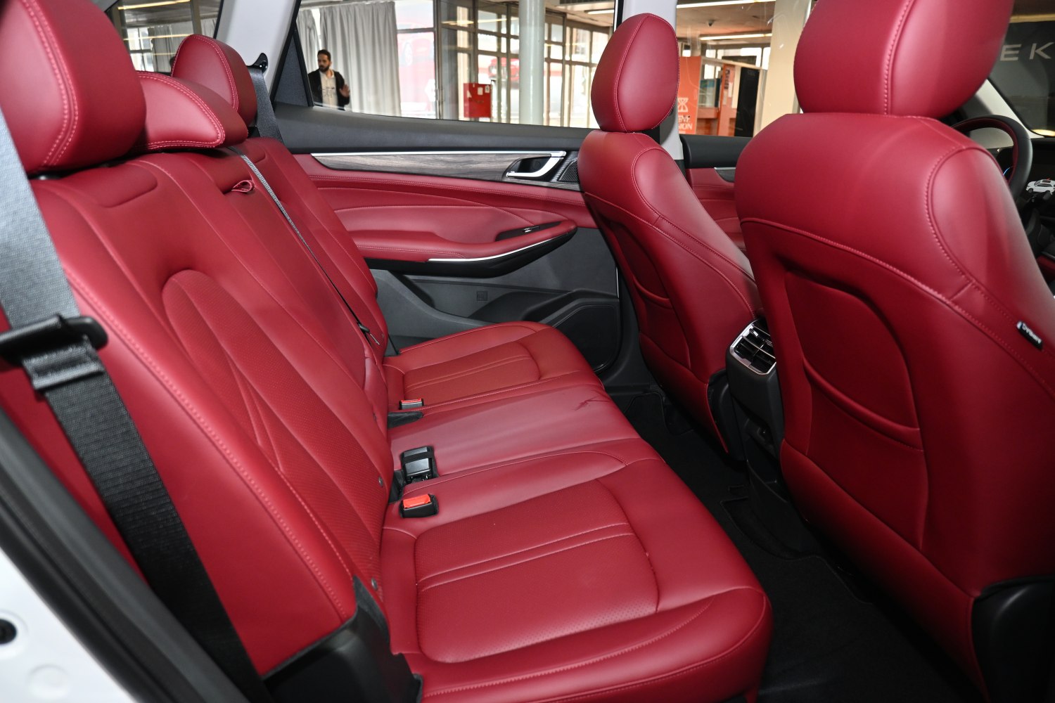 Red leather rear seats and premium car interior details