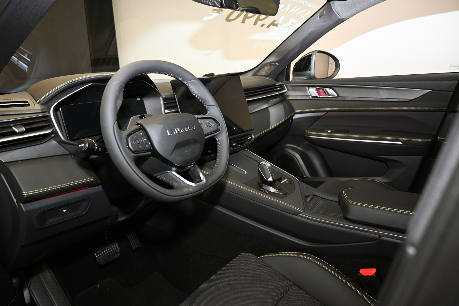 Modern interior with digital displays and steering wheel