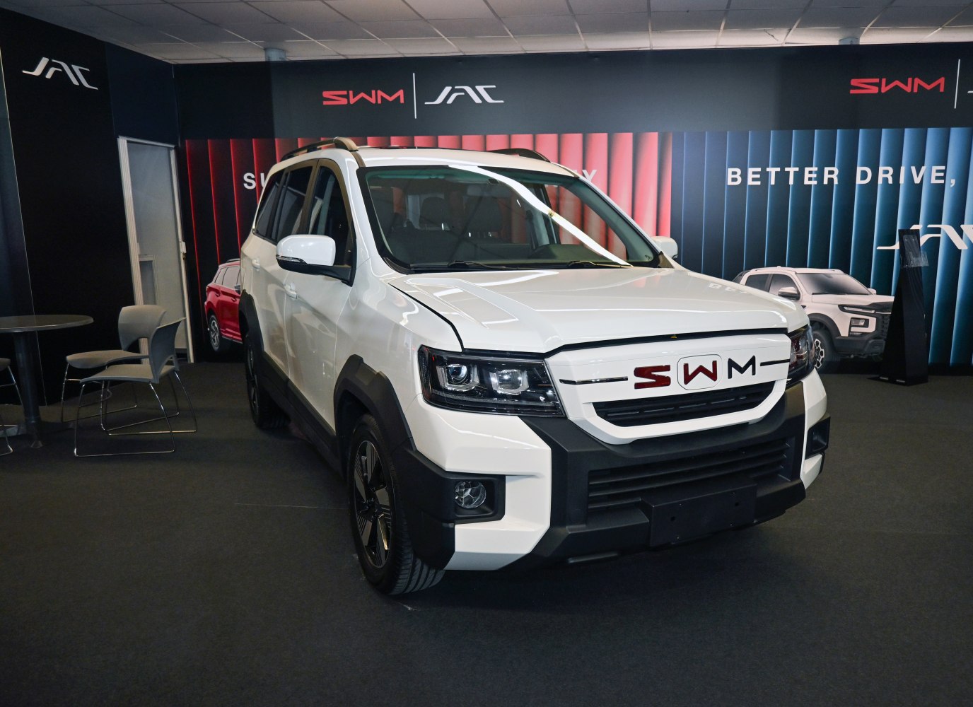 Front view of SUV with bold grille and LED headlights