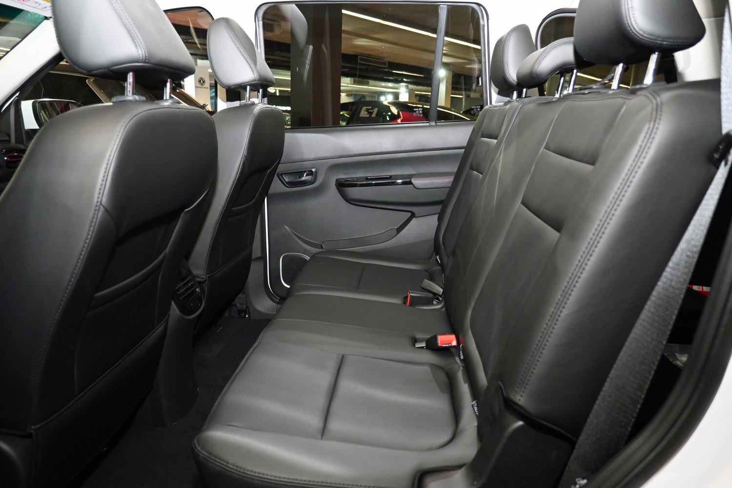Black leather rear seats with spacious legroom and headrests
