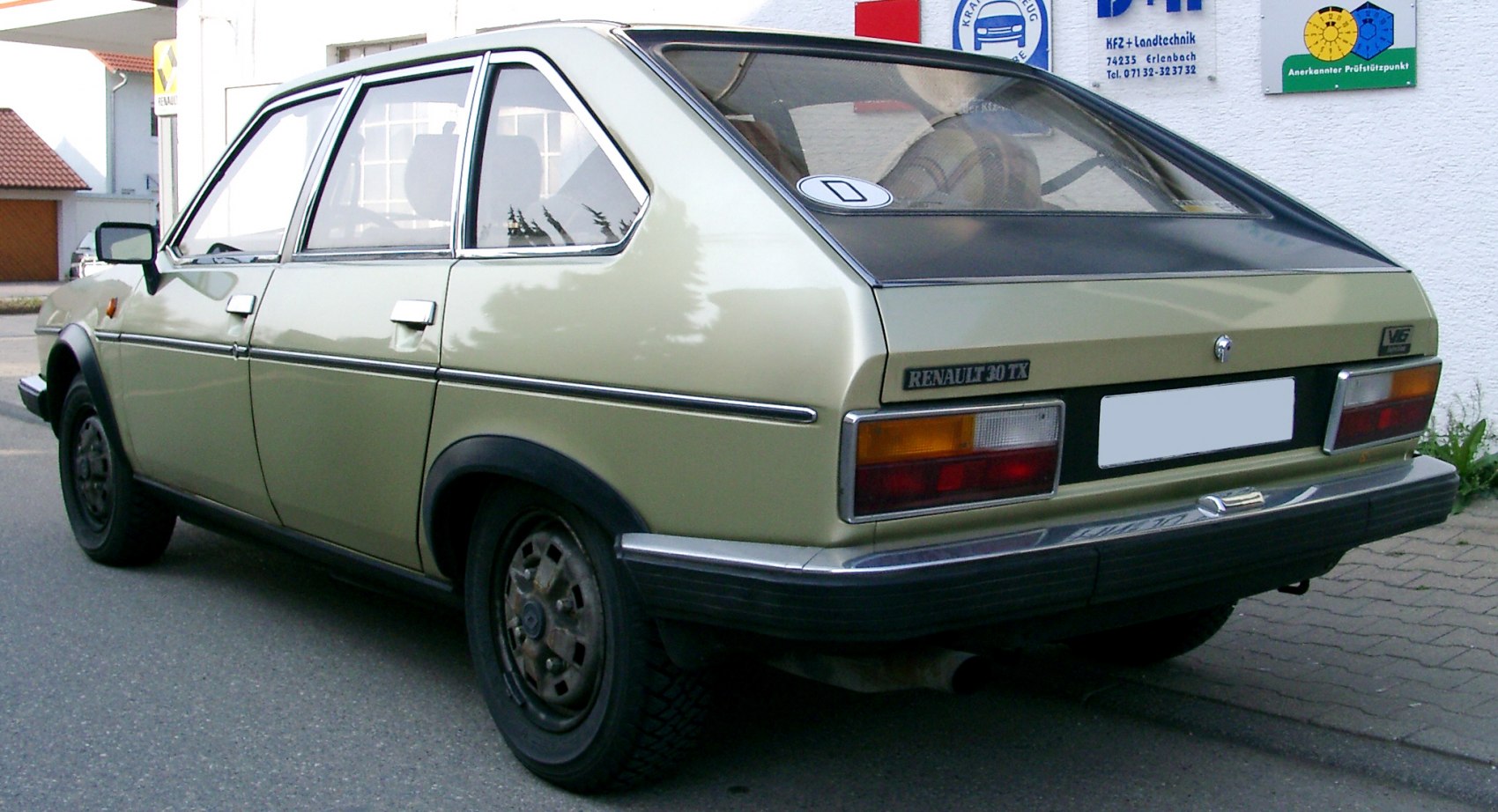 Rear and side profile showing hatchback design with distinct tail lights.