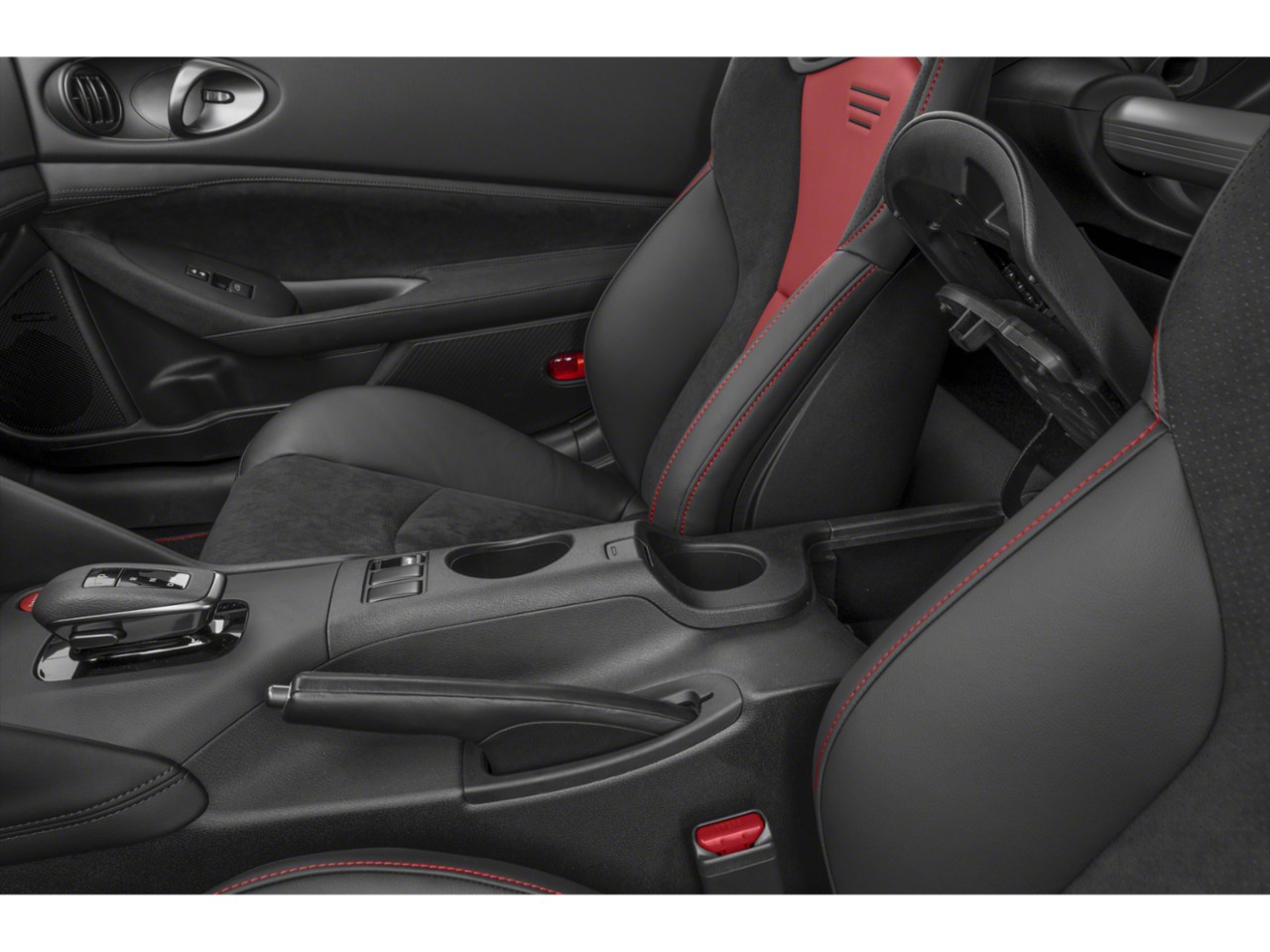 Sporty seats with red stitching and center console with handbrake and cup holders