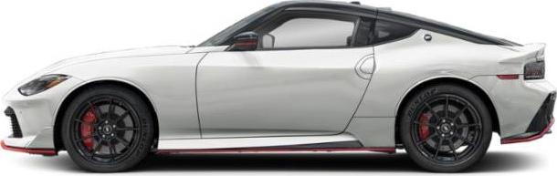 Side profile of sleek sports coupe with black alloy wheels and red brake calipers