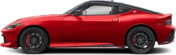 Side profile of a sporty red coupe with aerodynamic body and performance wheels