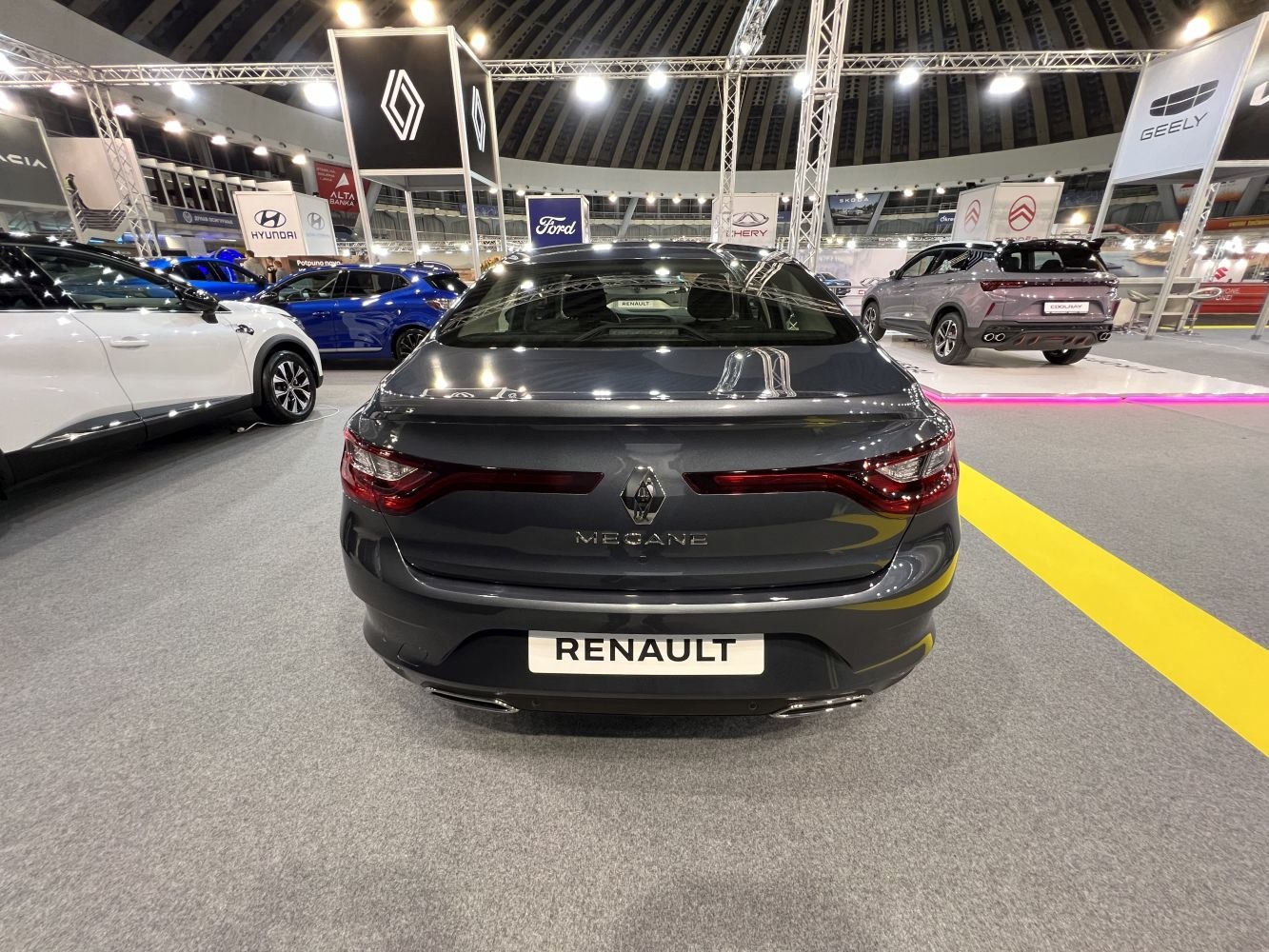Sleek rear view with connected tail lights and sporty rear design