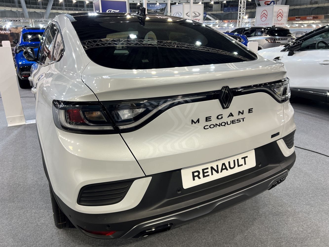 Modern rear design with sleek taillights and prominent branding