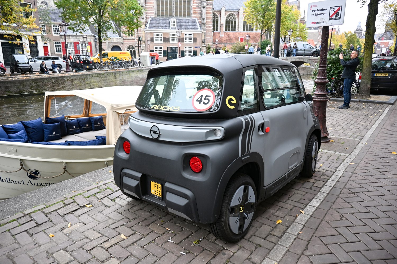 Compact electric microcar rear view with distinctive taillights