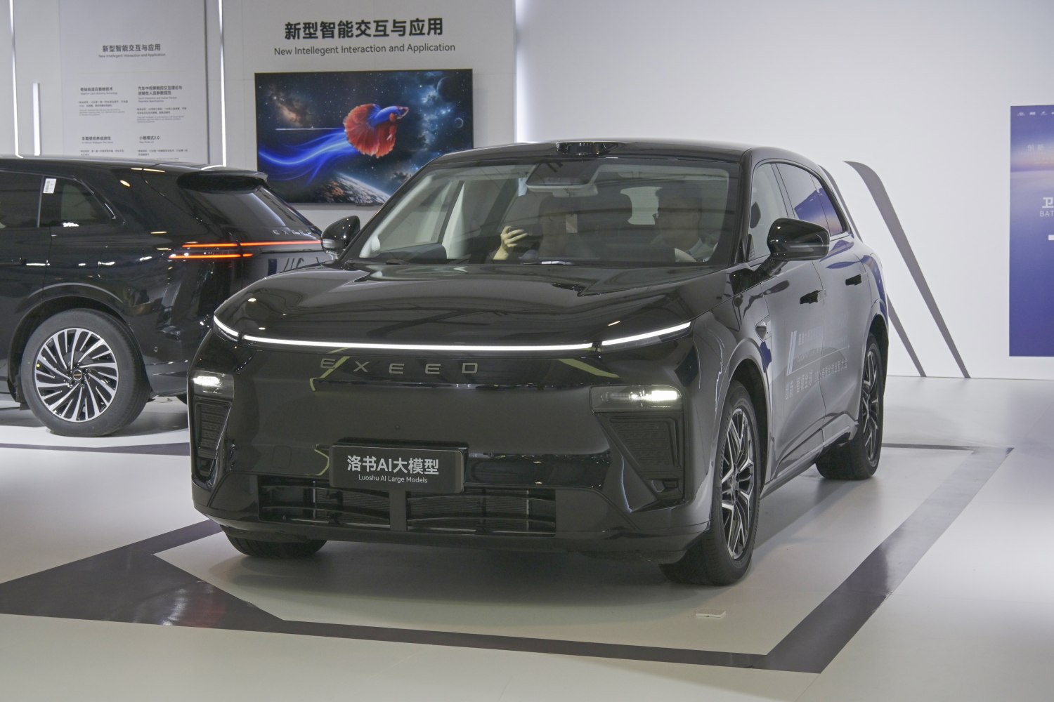Front view showcasing LED light bar and modern grille design