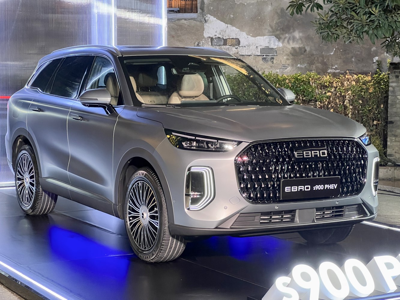 Sleek SUV with bold front grille and LED headlights