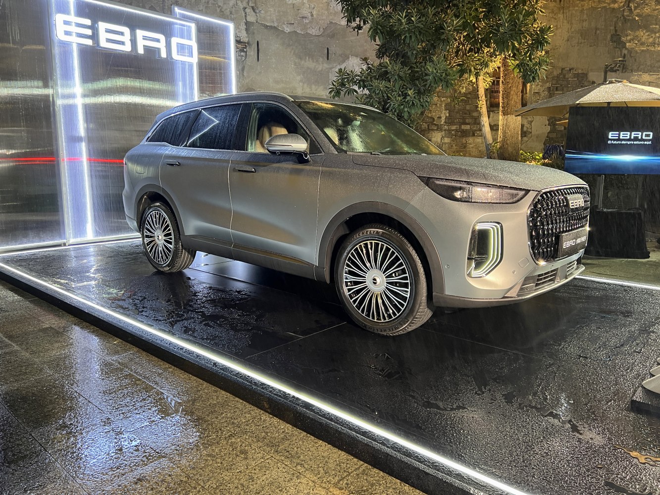 SUV side and front profile with LED headlights and large grille