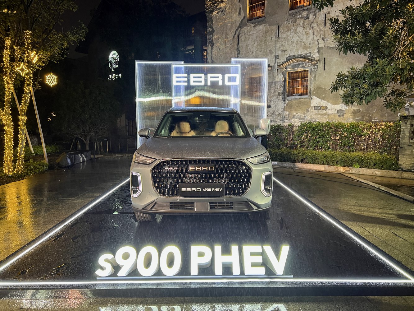 Front view with illuminated grille and distinctive LED lighting design
