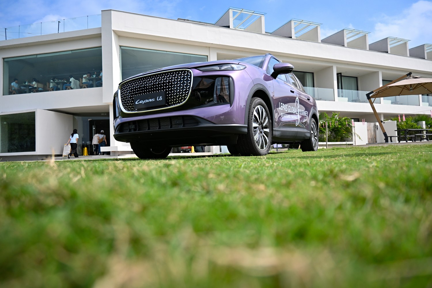 Futuristic SUV front grille and sleek headlights