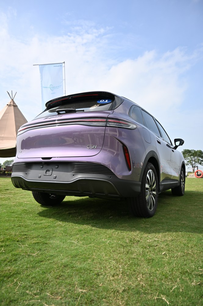 Rear perspective with modern taillights and aerodynamic bumper.