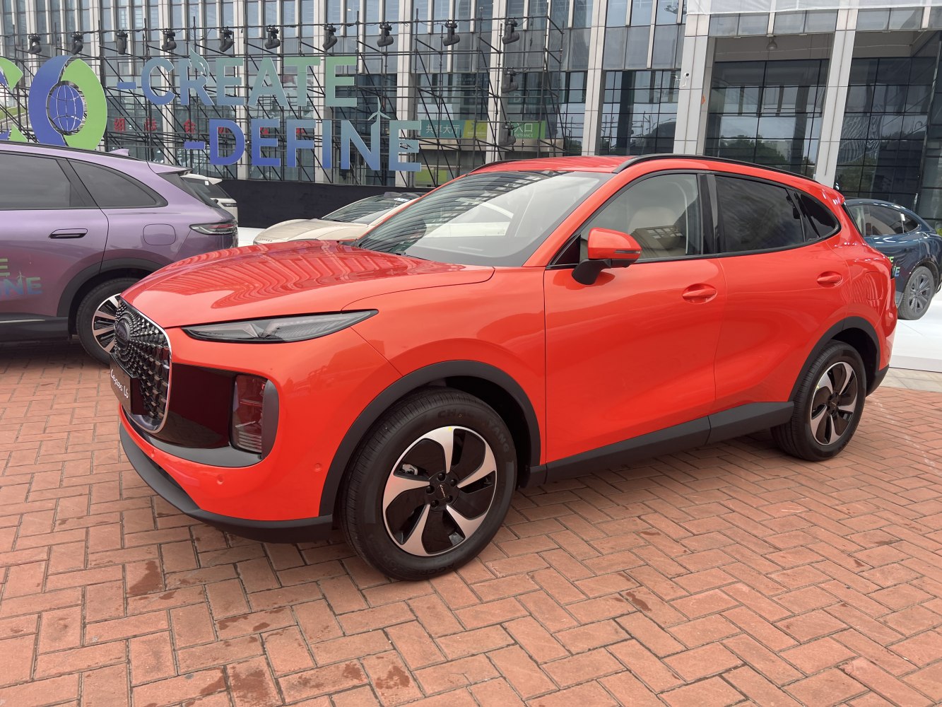 Sharp front-end design with aerodynamic headlights and distinctive alloy wheels