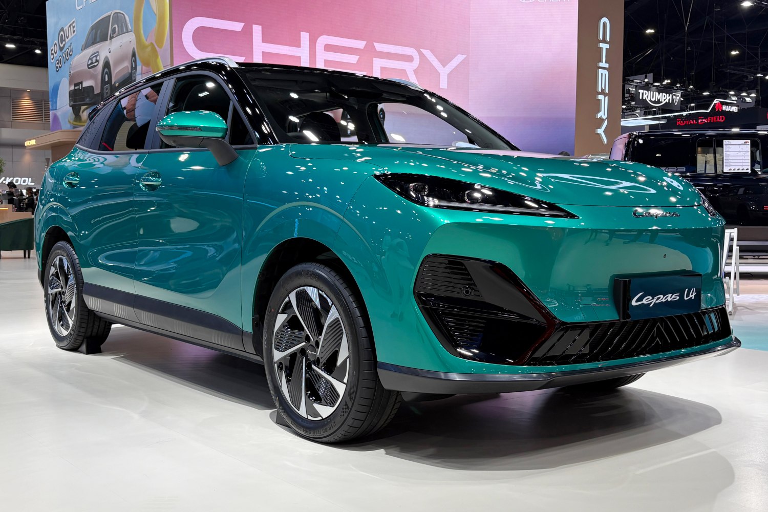 Sleek modern crossover with aerodynamic body and distinctive multi-spoke wheels