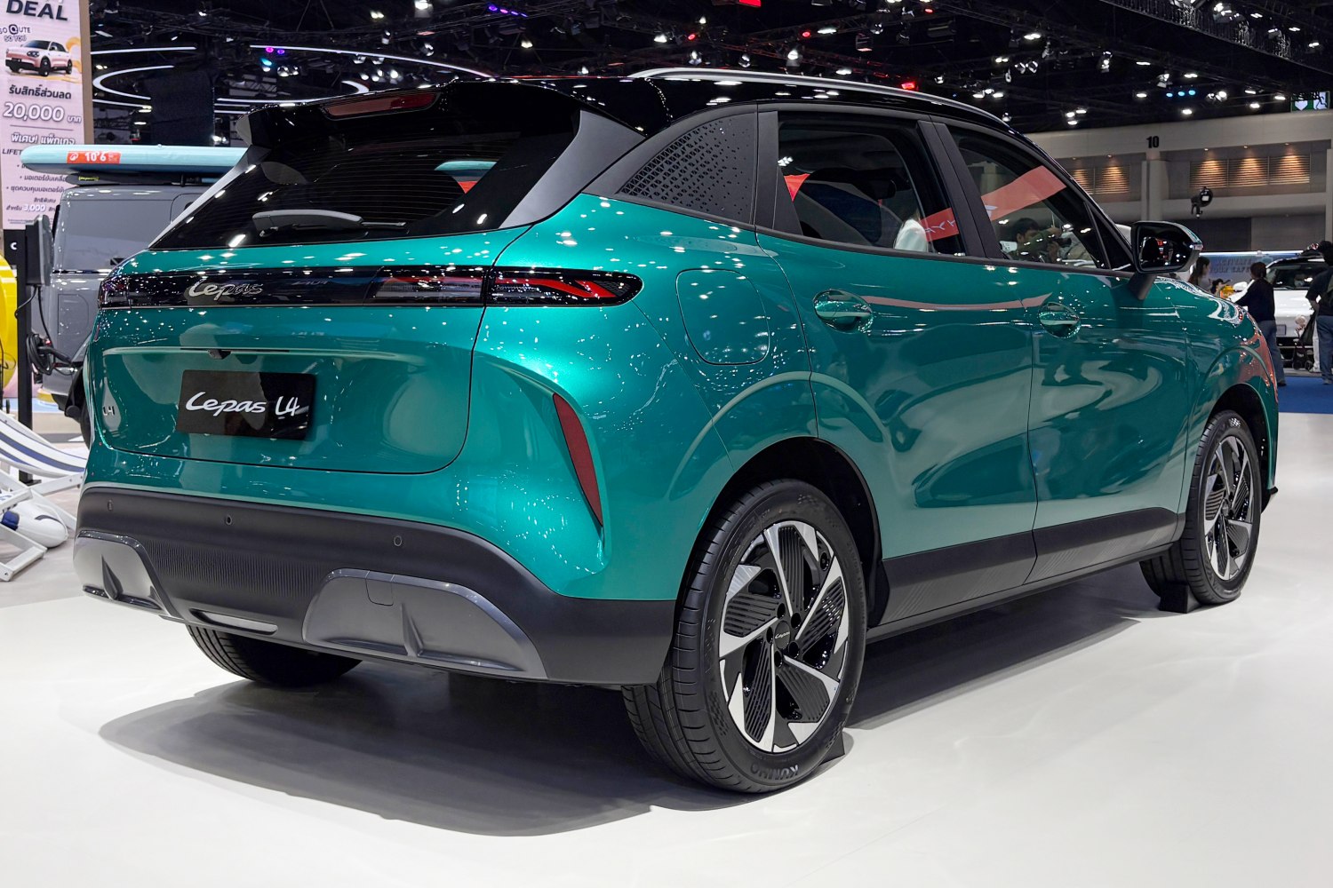 Sleek rear design with distinct connected taillight and modern alloy wheels.