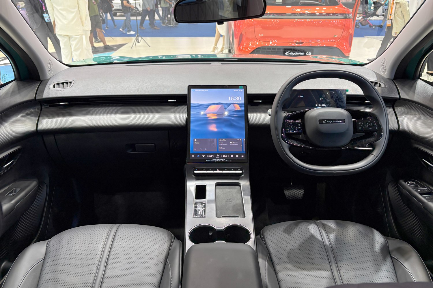 Digital dashboard and large vertical touchscreen central console.