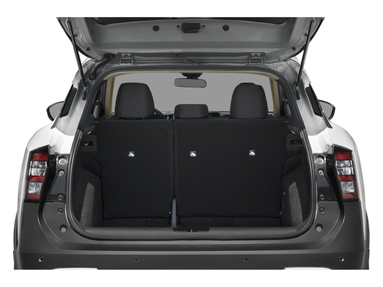 Open rear trunk with upright seats and spacious cargo area.