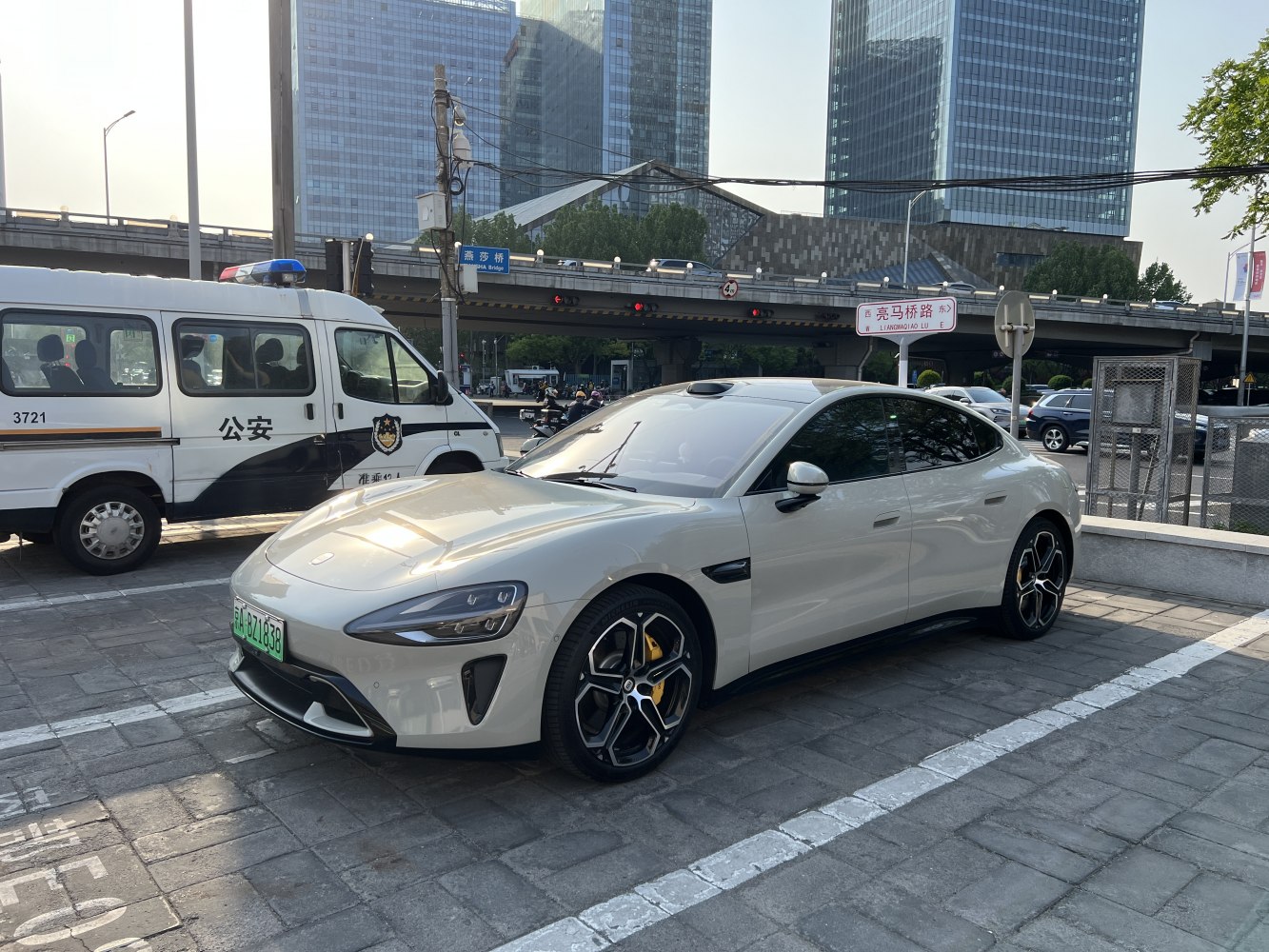 Sleek electric sedan with aerodynamic design and sporty alloy wheels