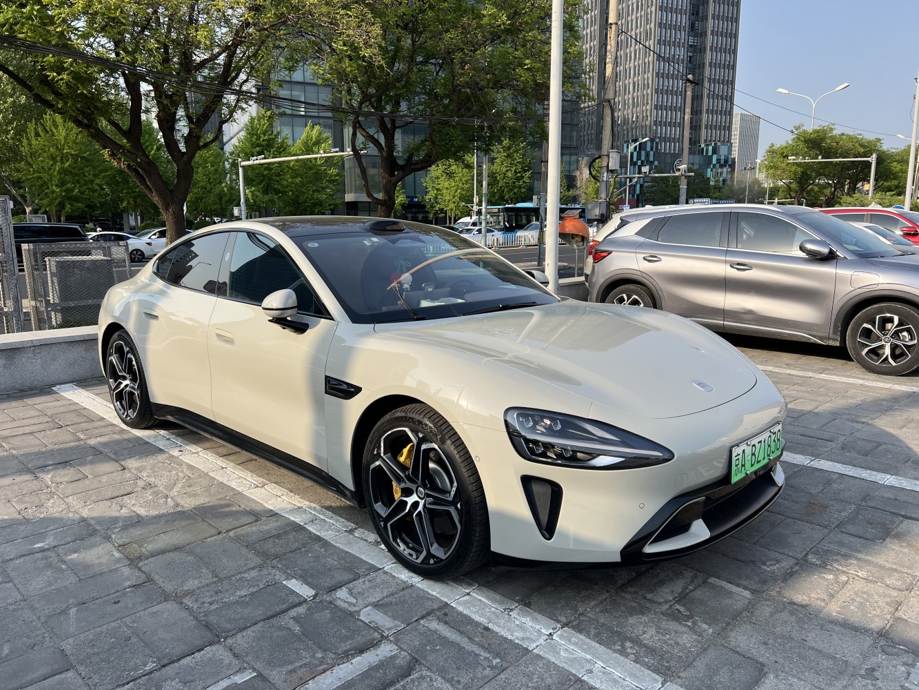 Sleek electric sedan with aerodynamic body and LED headlights