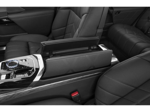 Center console storage and control panel with black leather seats.