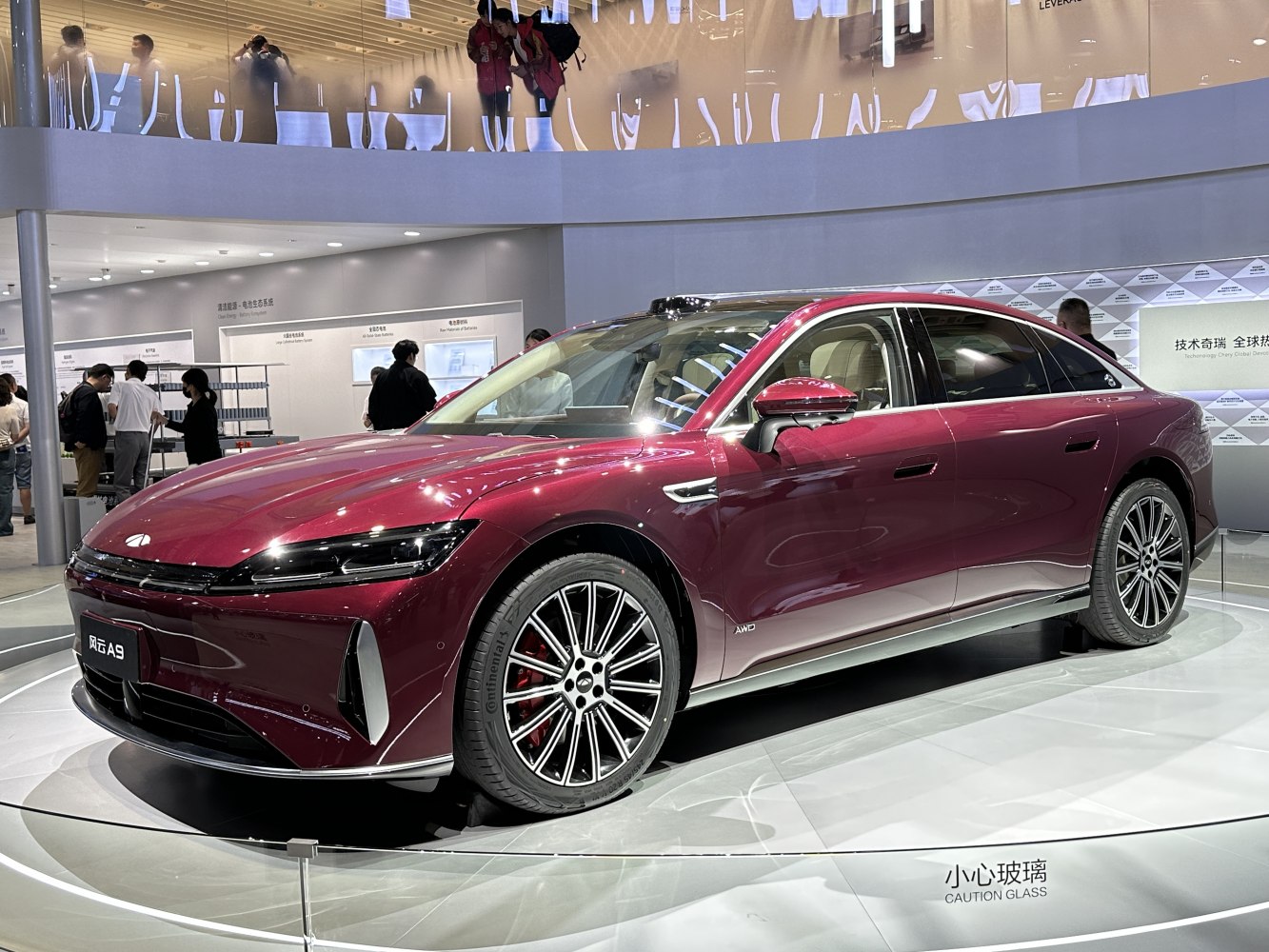 Sleek luxury sedan with LED headlights and multi-spoke alloy wheels