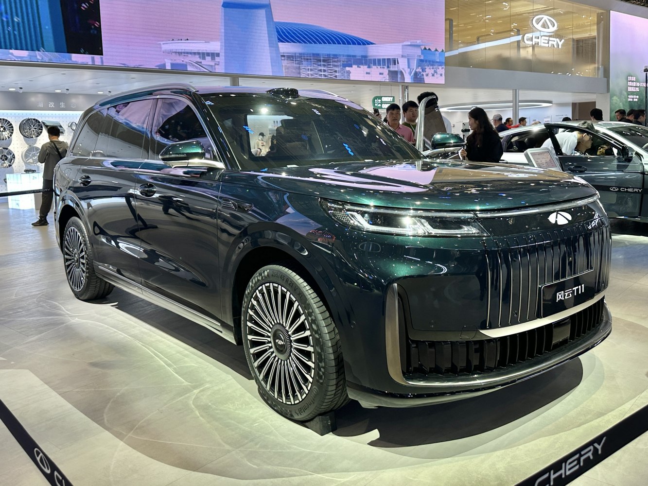 SUV with vertical slat grille and multi-spoke rims