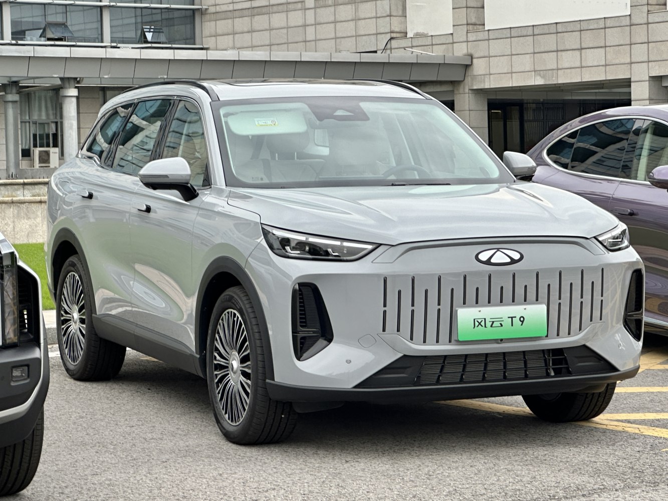 Sleek aerodynamic SUV with distinct LED headlights and vertical grille design