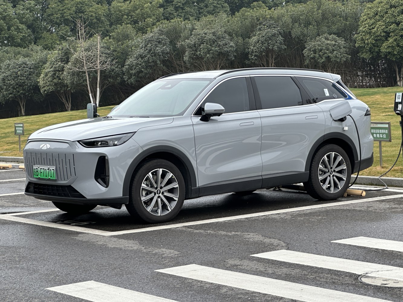 Electric SUV with distinct front grille and charging port