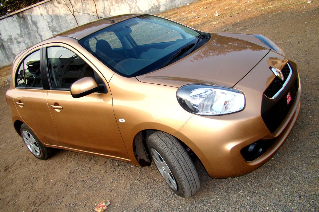 Compact hatchback with bold front grille and aerodynamic shape