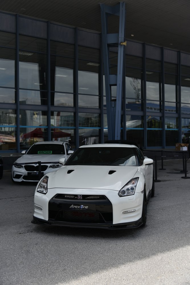 Aggressive front view of a 2011 sports car with vents and aerodynamic design