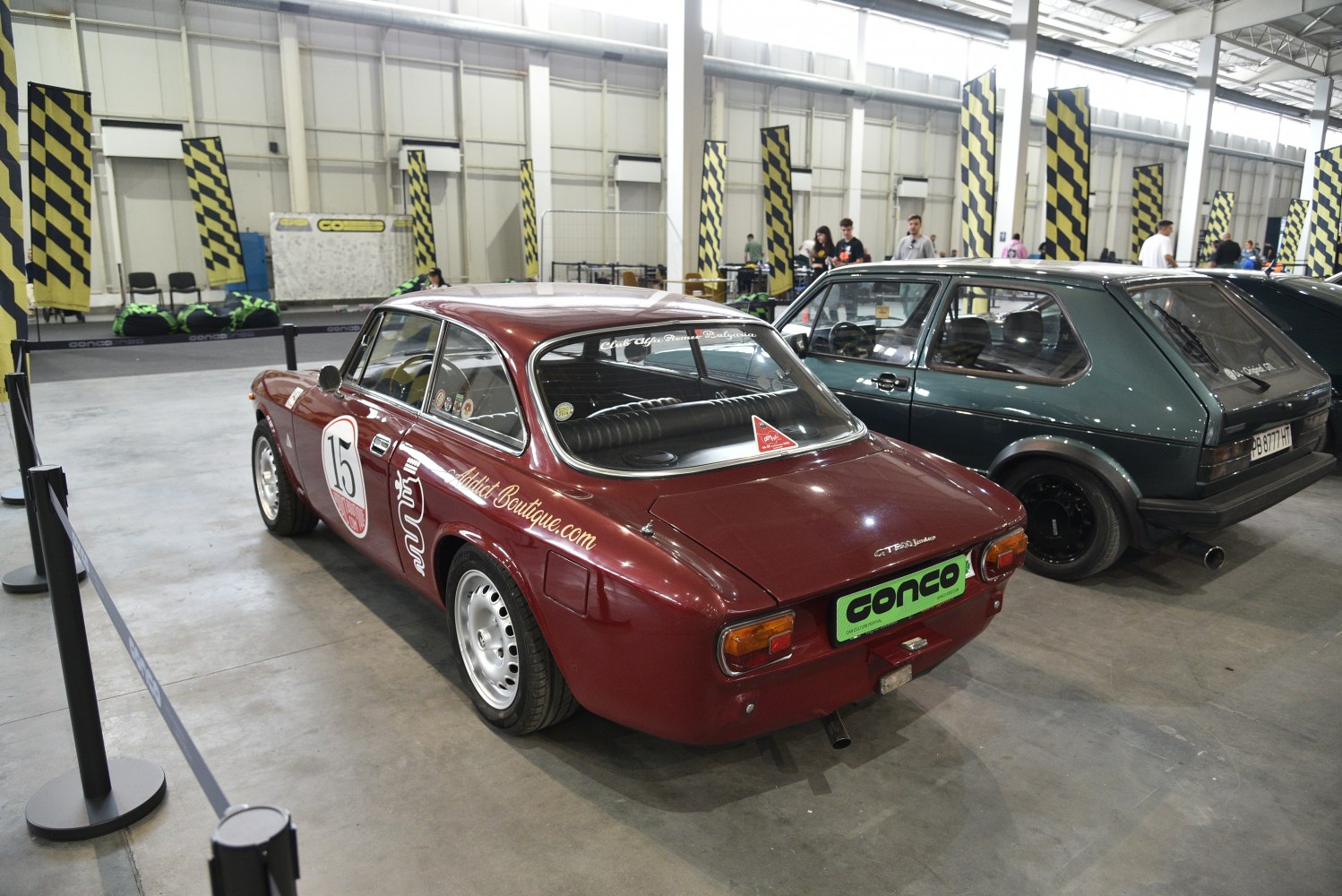 Vintage racing coupe with distinctive classic rear design and retro style.