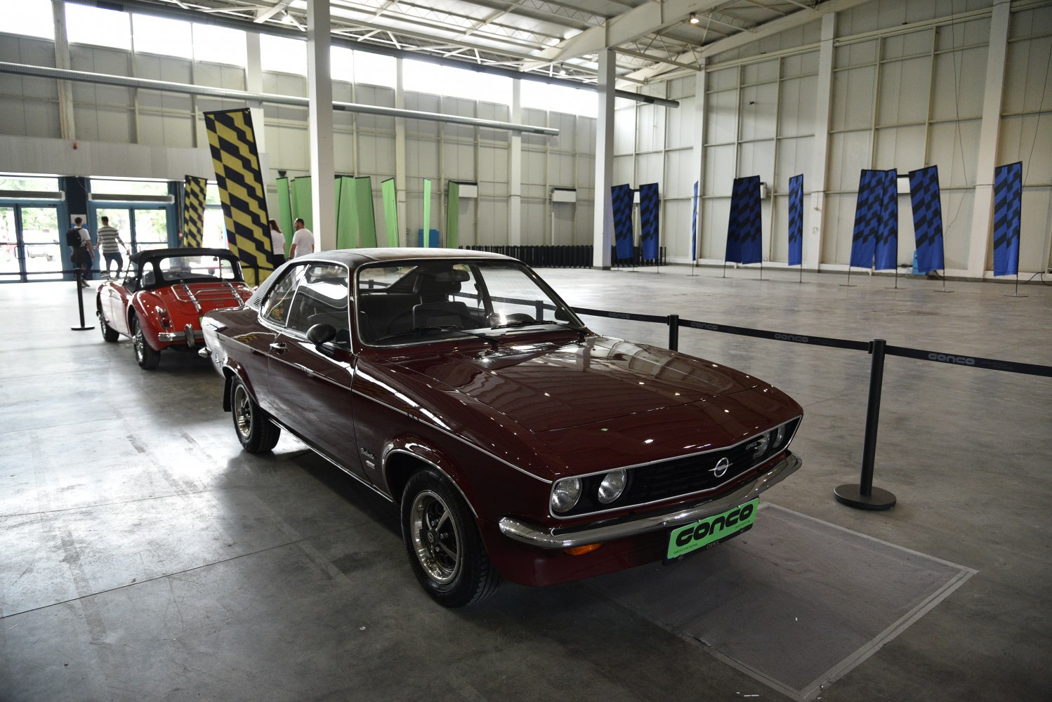 Classic coupe with dual round headlights and sleek front design