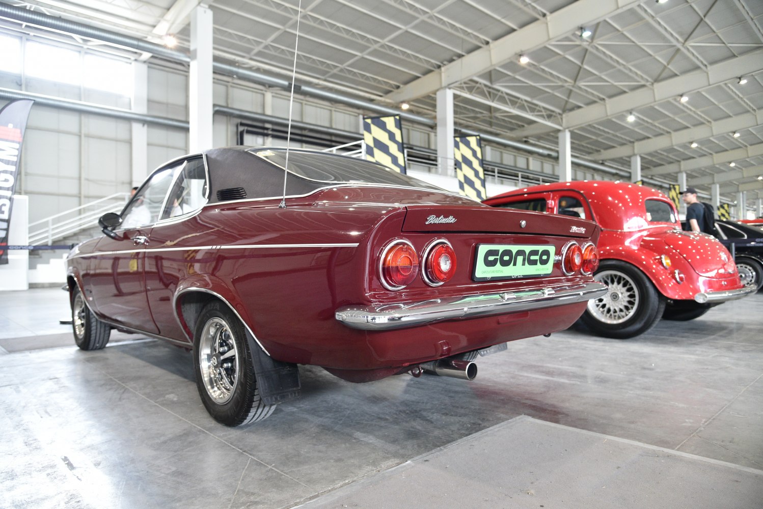 Rear view with round taillights and chrome bumper
