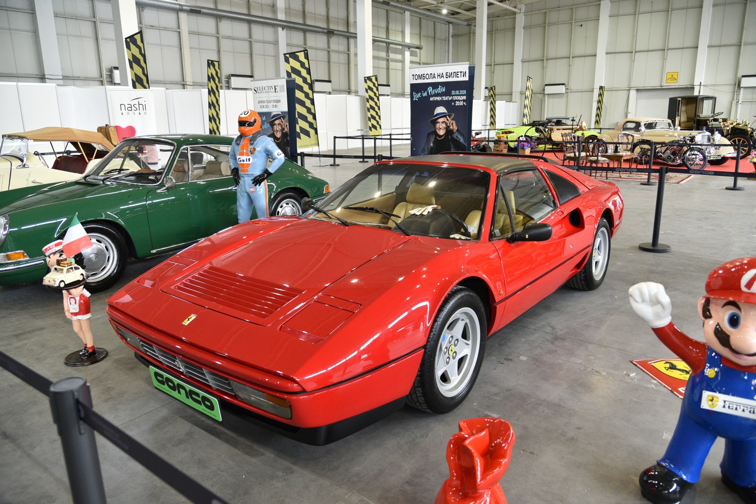 Red sports coupe with pop-up headlights and tan interior