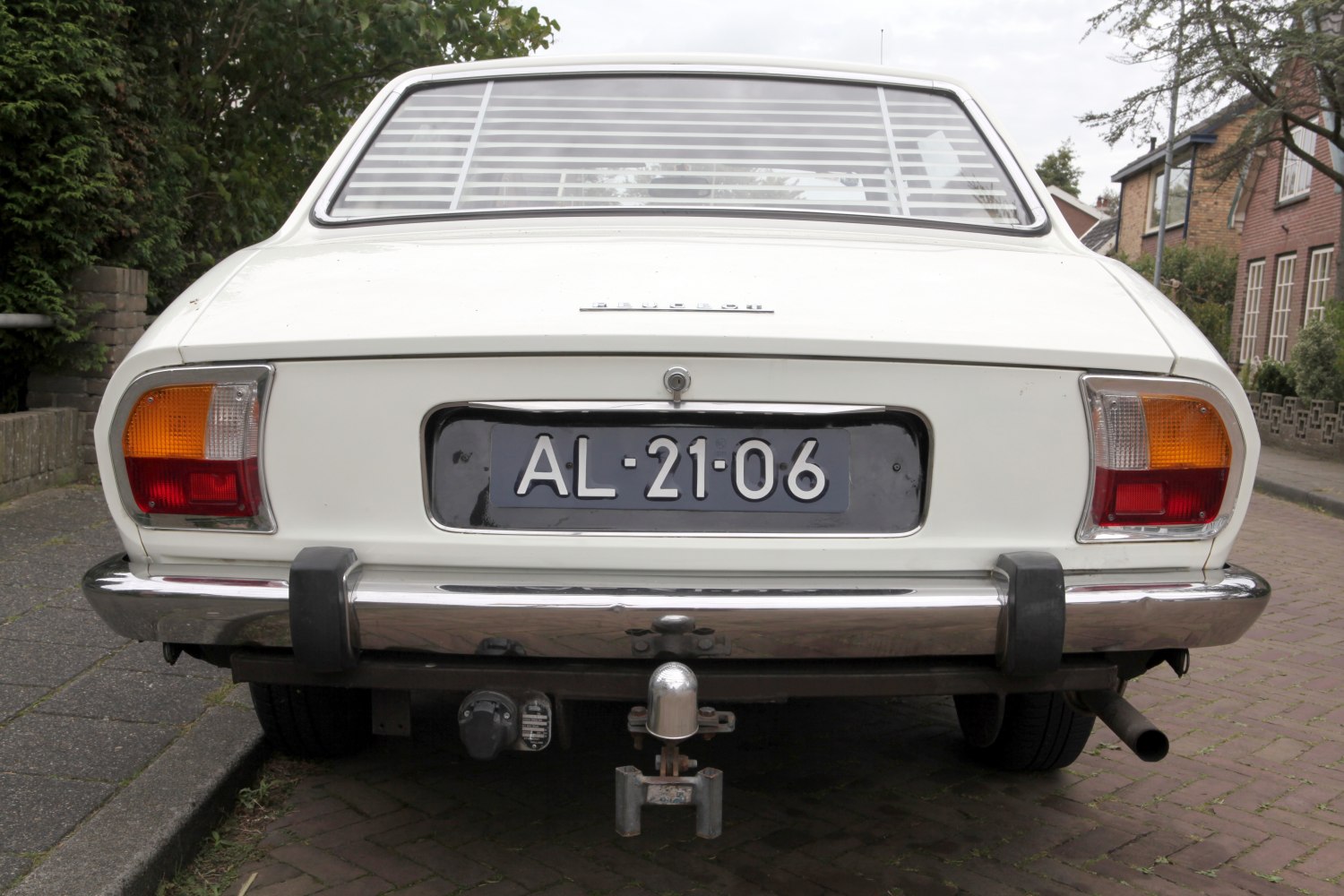 Rear view with classic tail lights and tow hitch