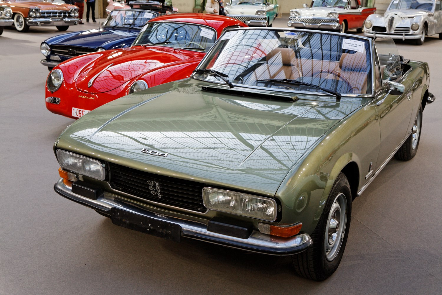 Classic convertible with distinct front grille and headlights