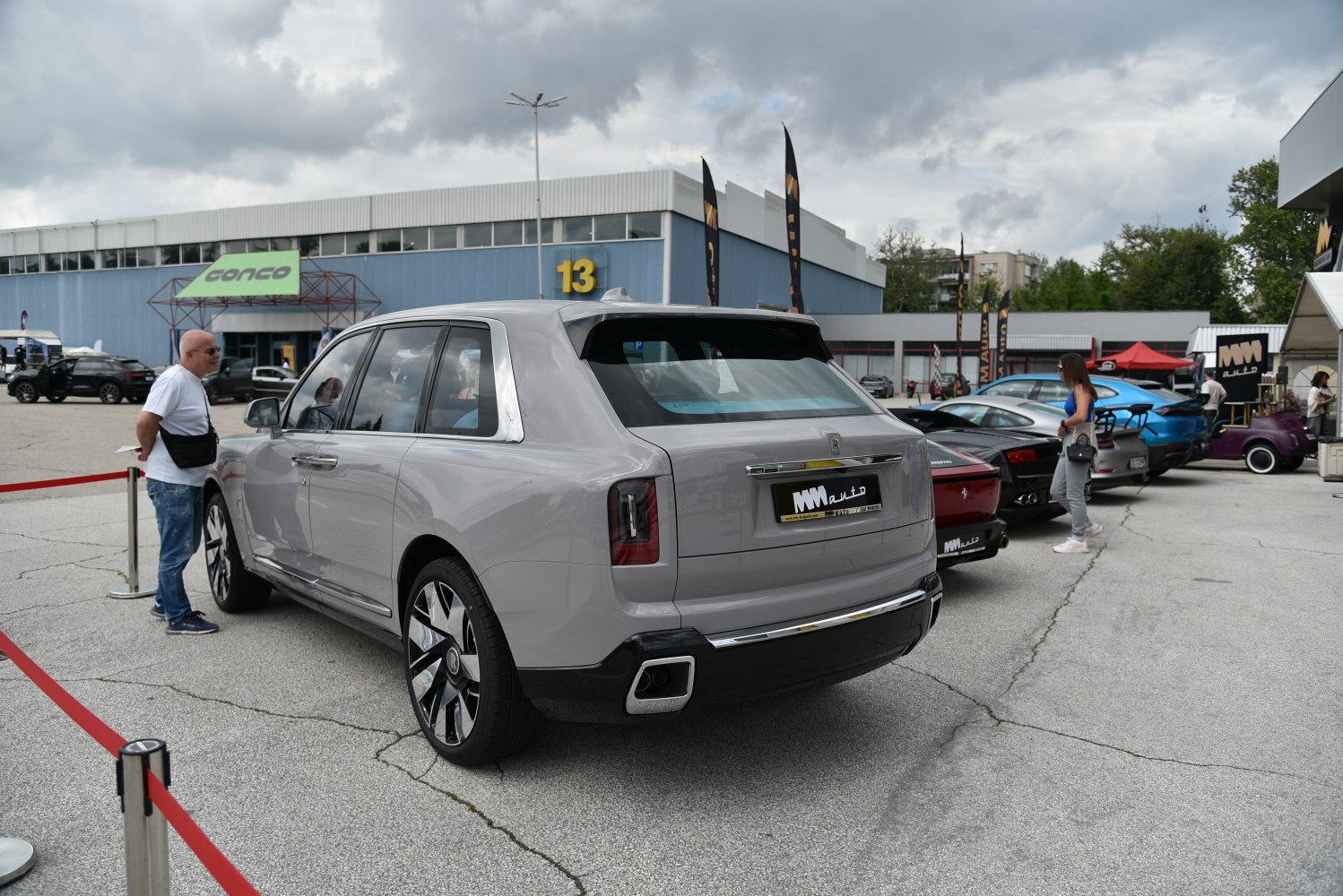 Rear view of luxury SUV with dual exhausts and large alloy wheels