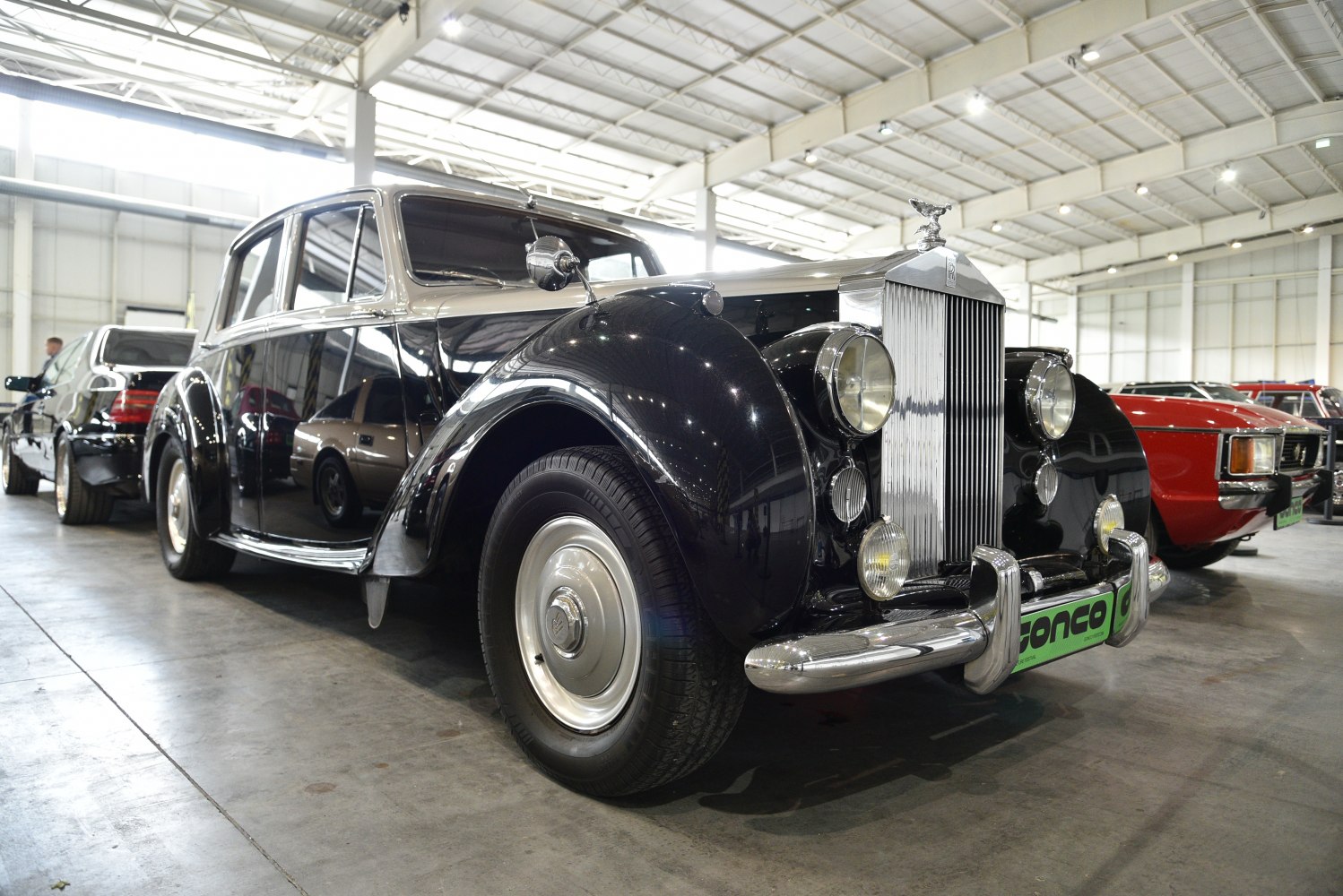 Classic vintage car with chrome grille and round headlights