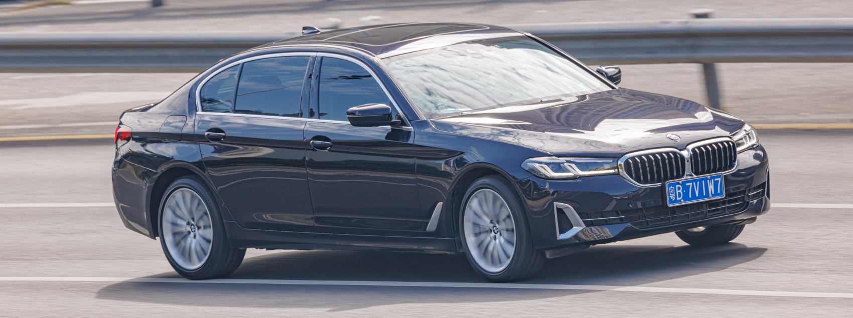 Front and side profile with alloy wheels in motion