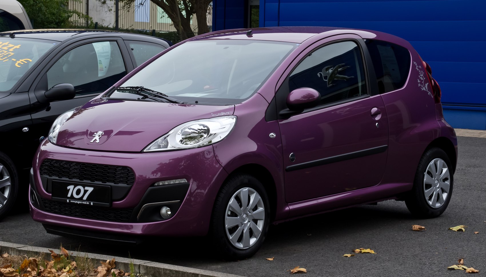 Compact 3-door hatchback with distinctive headlights and sporty front design