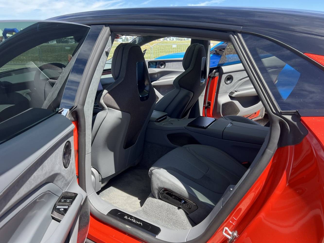 Spacious rear seating area with modern, ergonomic seats and premium interior materials