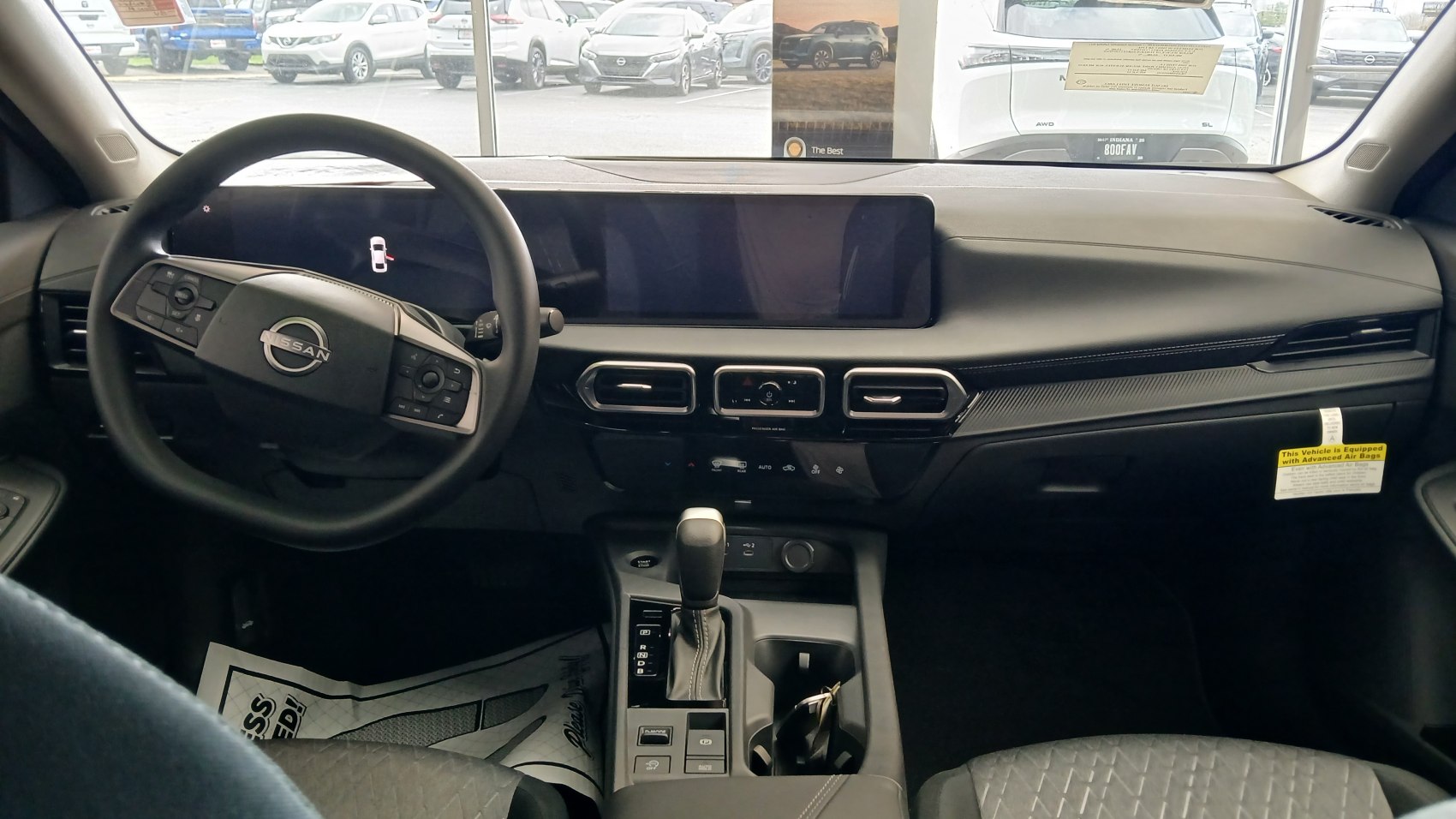 Digital dashboard and ergonomic steering wheel inside car interior