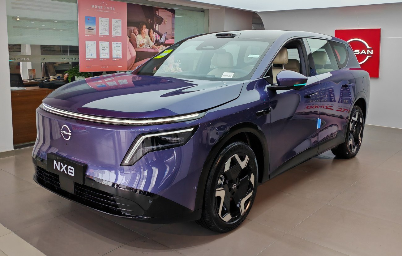 Futuristic front exterior and aerodynamic shape of a modern electric SUV.